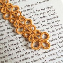 Gold bookmark in tatted lace
